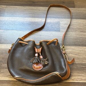 vintage Dooney & Bourke All-Weather Leather drawstring bucket bag in brown